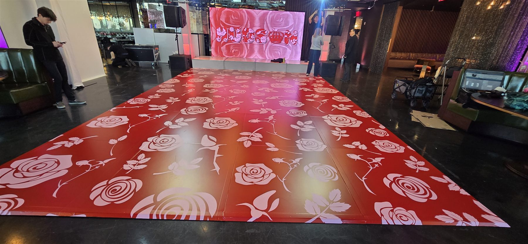 Custom-printed rose pattern dance floor by Adicora