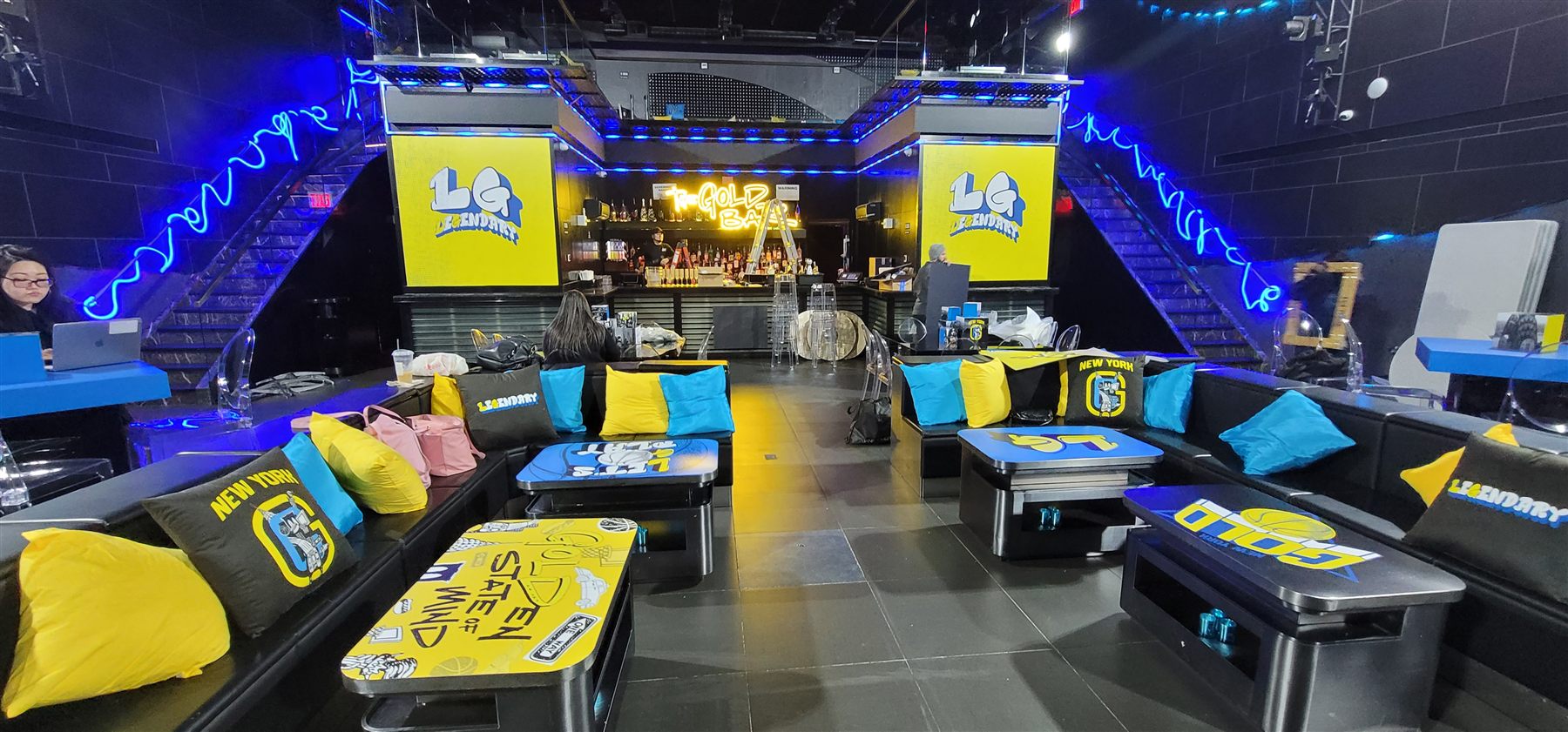 Custom printed lounge decor and signage by Adicora for a themed event