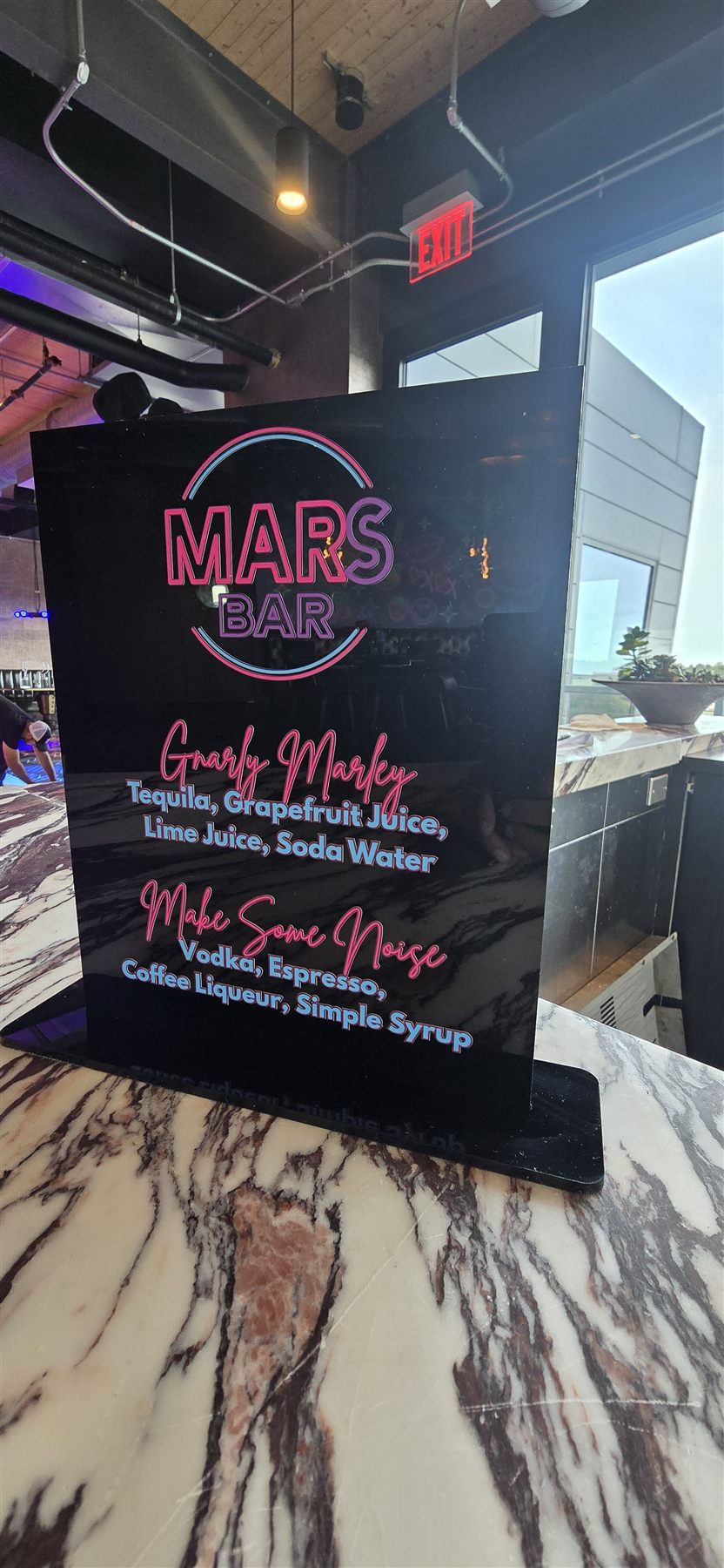 Custom neon-style bar menu sign by Adicora