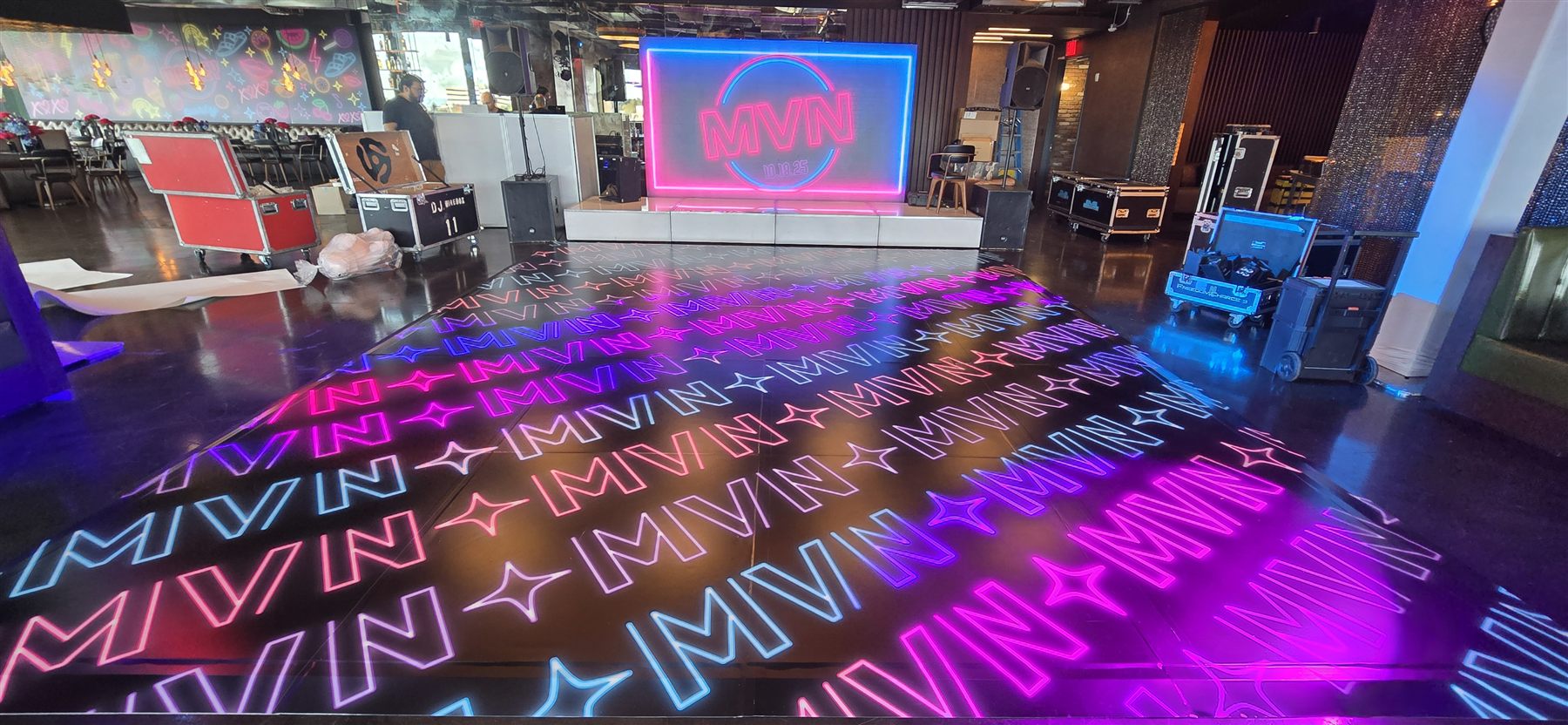 Custom-printed neon pattern dance floor by Adicora