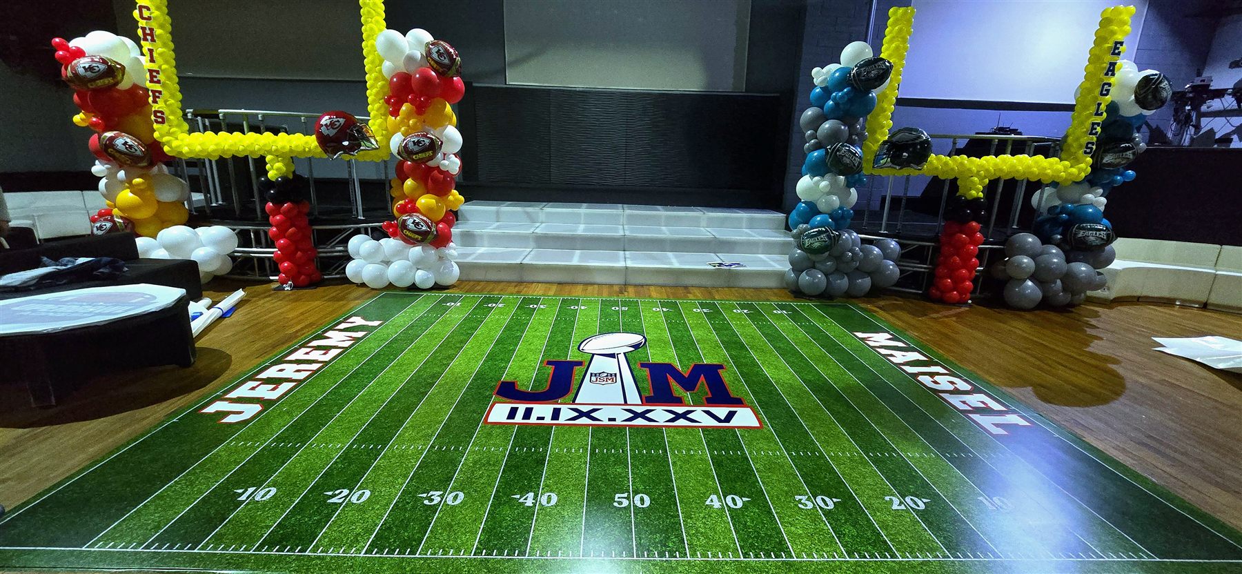 Custom-printed sports-themed dance floor by Adicora